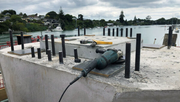 making sure the steel aligns with the existing pier and bolts